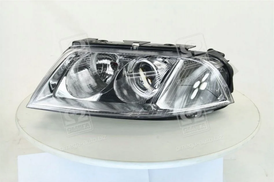 Фара передняя wv pasat 2001-2005 w/dust cover lh electric w/o motor TYC 20-6244-05-2B (фото 1)